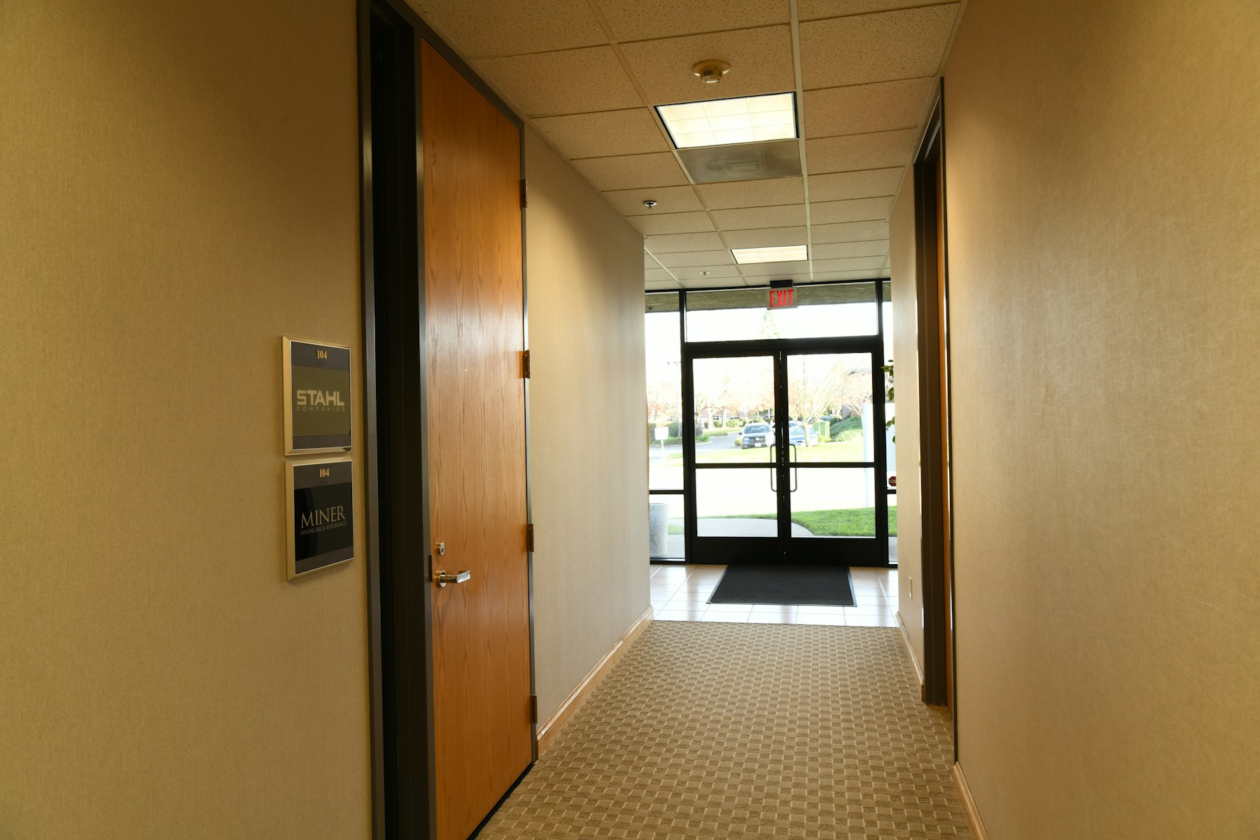 Office corridor with locked suite doors