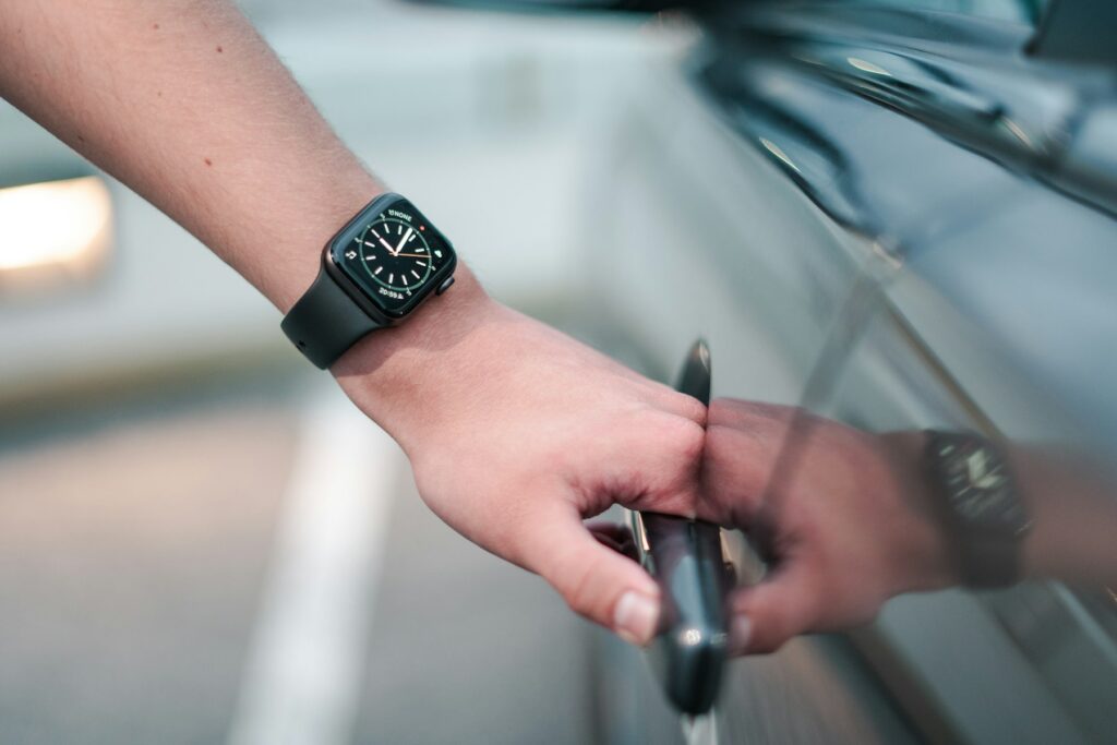 Hand on a car door handle