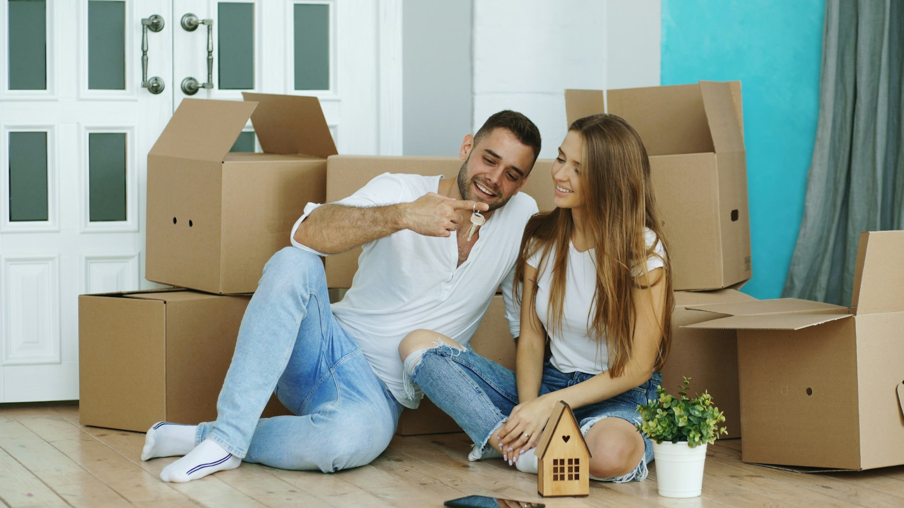 Couple with the keys to their new home