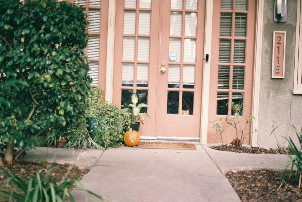 Pink front doors of a Florida home