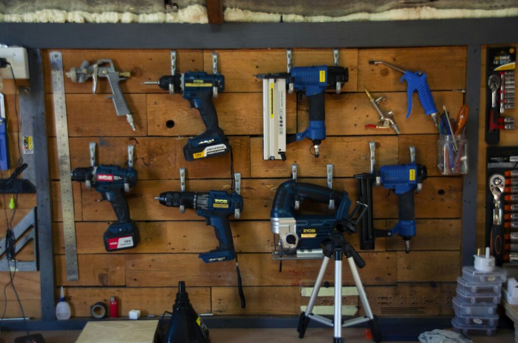Power tools on a workshop wall