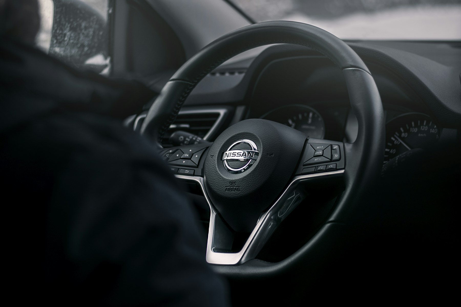 Steering wheel and dash inside a car